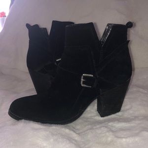 Black sued over ankle boots